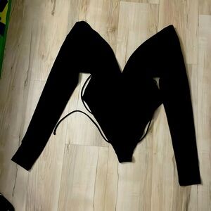 Forever 21 black long sleeve swimsuit. Size XL.